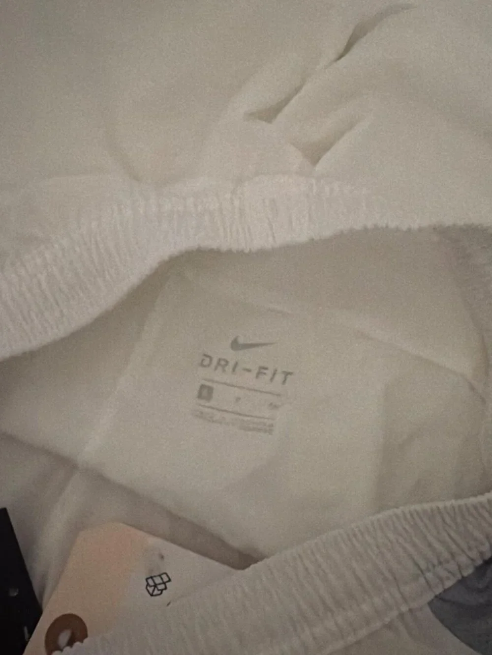 Nike white shorts with gray side panels